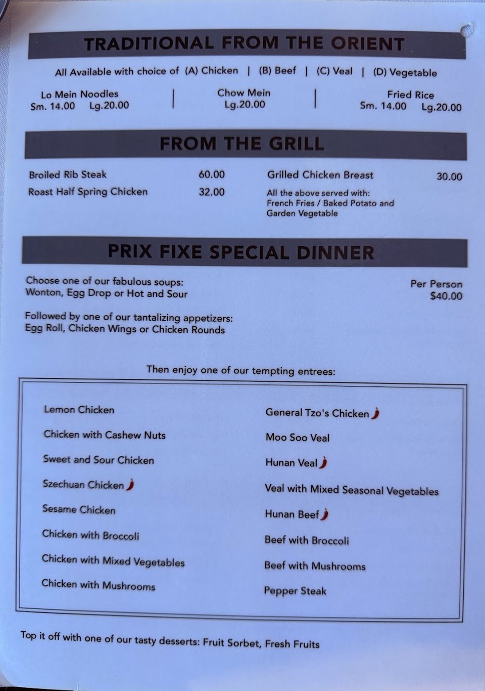 Close-up of menu categories and dish names.